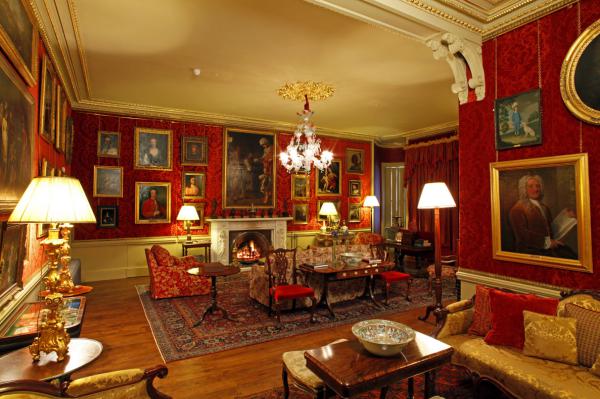 Aldourie Castle - Red Drawing Room at night. Inverness, Scotland