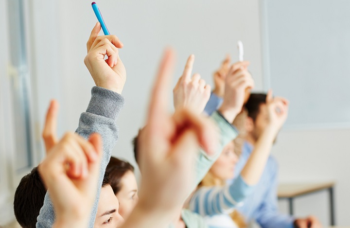 bigstock-Many-students-raising-their-ha-44817961