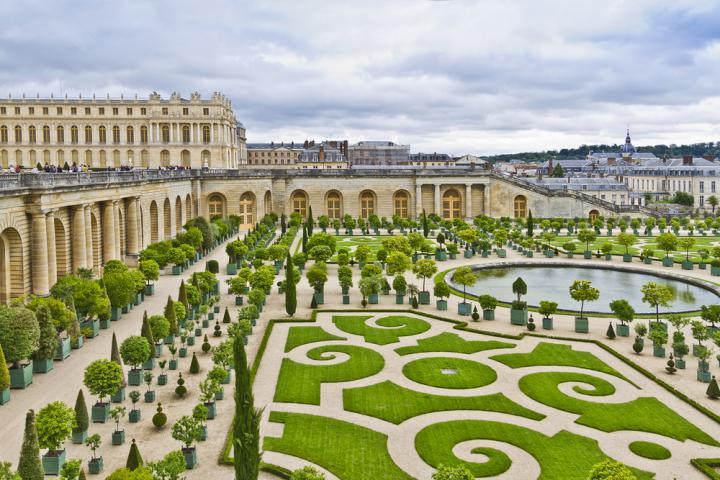 shutterstock_Orangery was designed by Louis Le Vau, it is located south of the Palace Versailles, Paris, France. Versailles was a royal chateau. It was added to the UNESCO list of World Heritage Sites